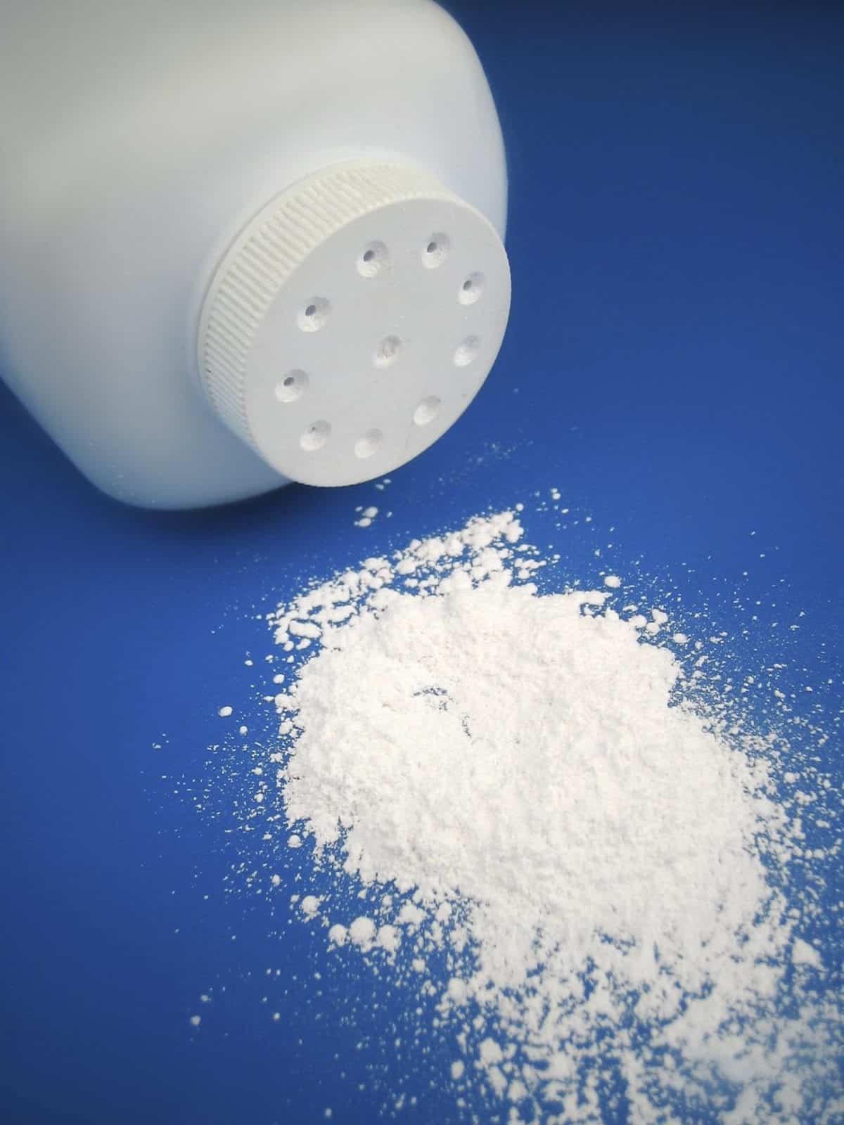 Spilled Bottle Of Talcum Powder Stock Photo