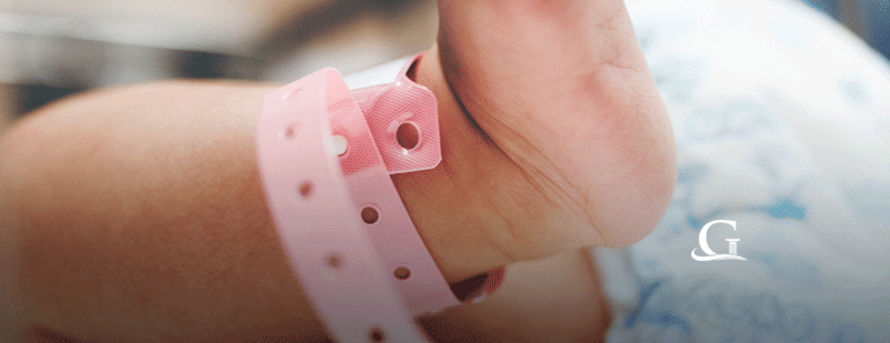 A Baby's Foot In The Hospital Stock Photo