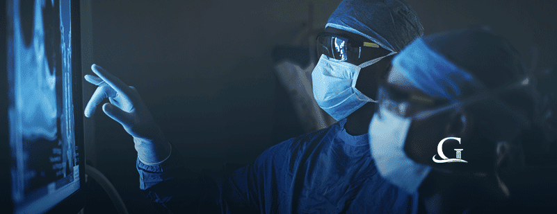 Two Doctors Reviewing An X-Ray Stock Photo