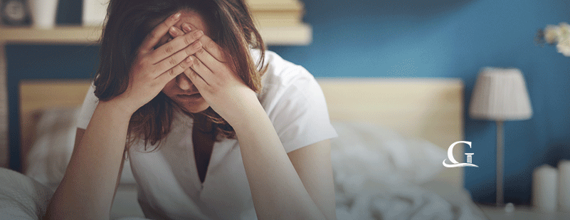 Woman Covering Her Eyes In Distress Stock Photo