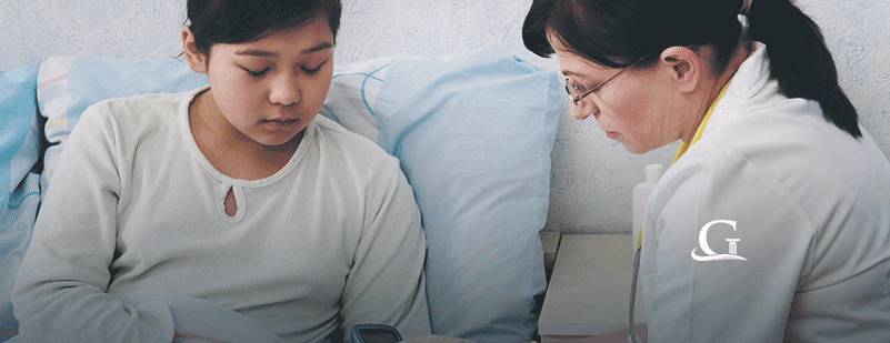 Doctor Taking Patient's Blood Pressure Stock Photo