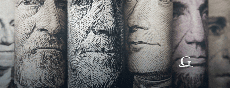 Rolled Up Dollar Bills Stock Photo