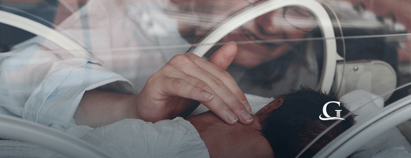 Small Baby Inside Incubator Stock Photo