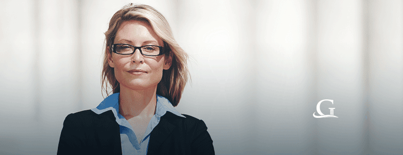 Female Essure Lawyer Smiling At The Camera Stock Photo