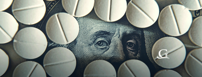 Prescription Pills On $100 Dollar Bill Stock Photo