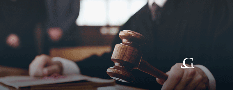 Judge Using Gavel Stock Photo