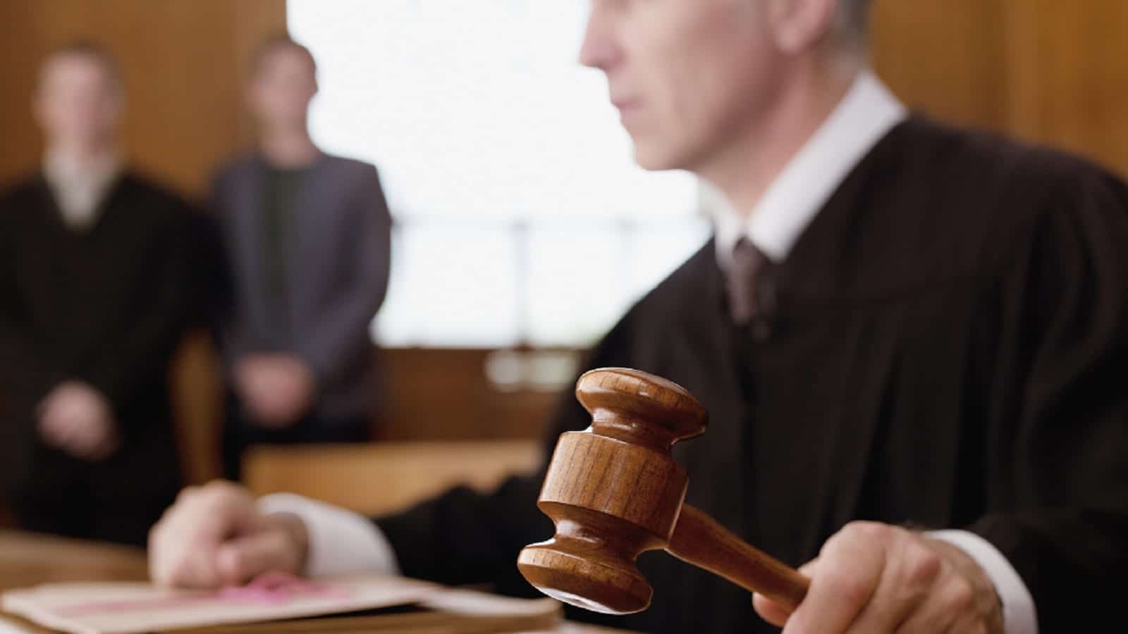 Judge Using His Gavel Stock Photo
