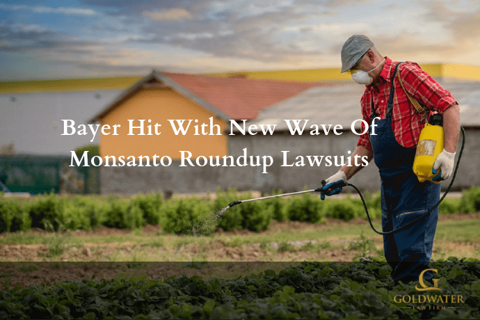 Man Using Monsanto Roundup Stock Photo