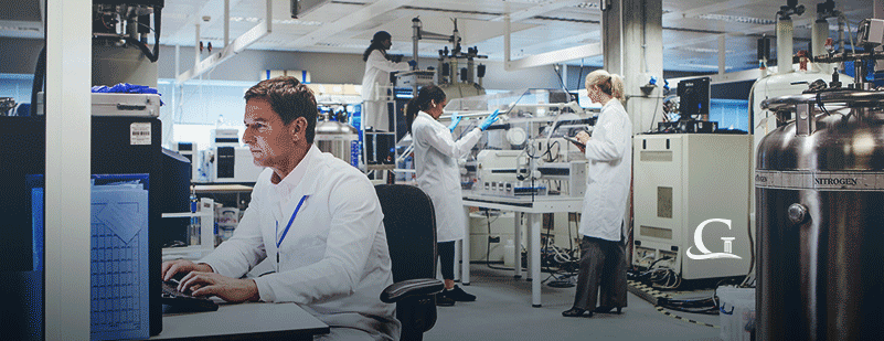 Medical Researchers Inside A Research Facility Stock Photo