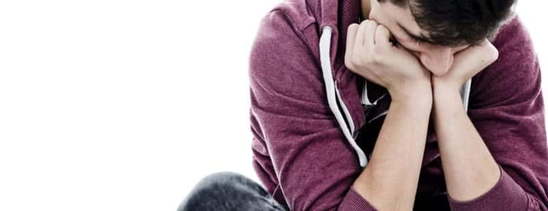 Worried Male Teenager Stock Photo