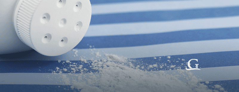 Spilled Talcum Powder Bottle Stock Photo
