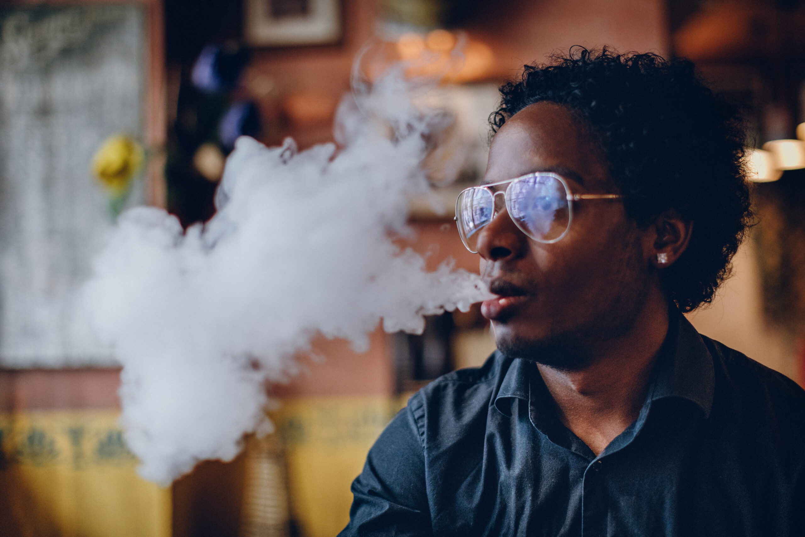 young-man-smoking-electonic-cigarettes