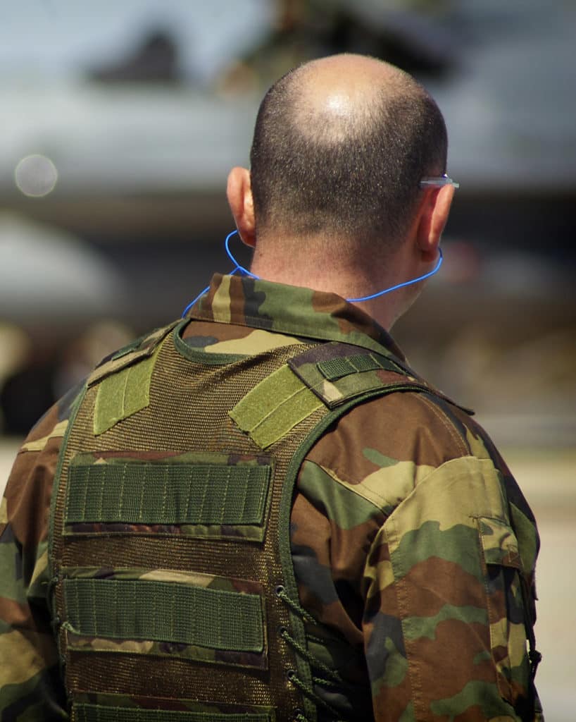 military members using earplugs to prevent hearing loss